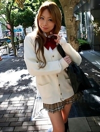 Remika Uehara poses on the street