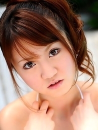 Lovely Japanese babe enjoys posing