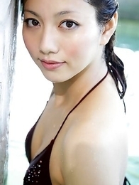 Japanese Marie Kai in shorts shows sexy curves in bath suit at pool