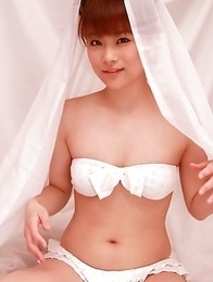 Satomi Shigemori in white lingerie plays with bride veil