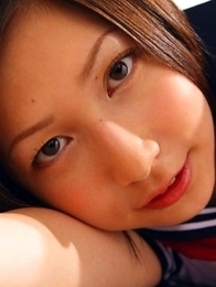 Kaori Ishii is naughty and shows legs under uniform skirt